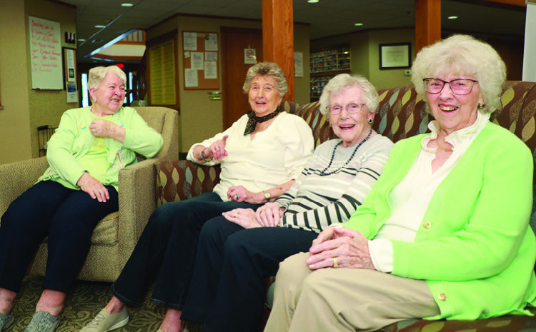 Four ladies smiling