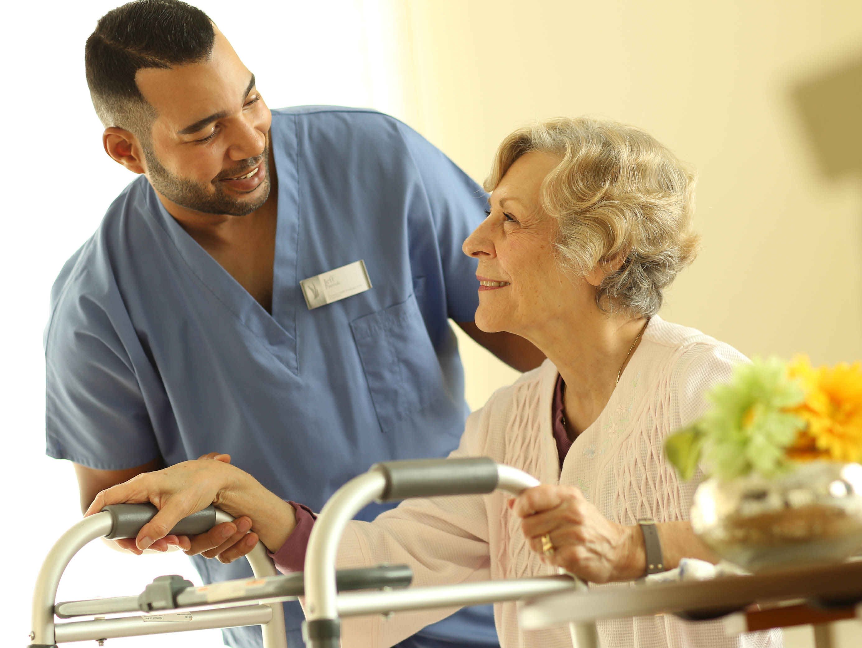 a healthcare worker with an elderly woman