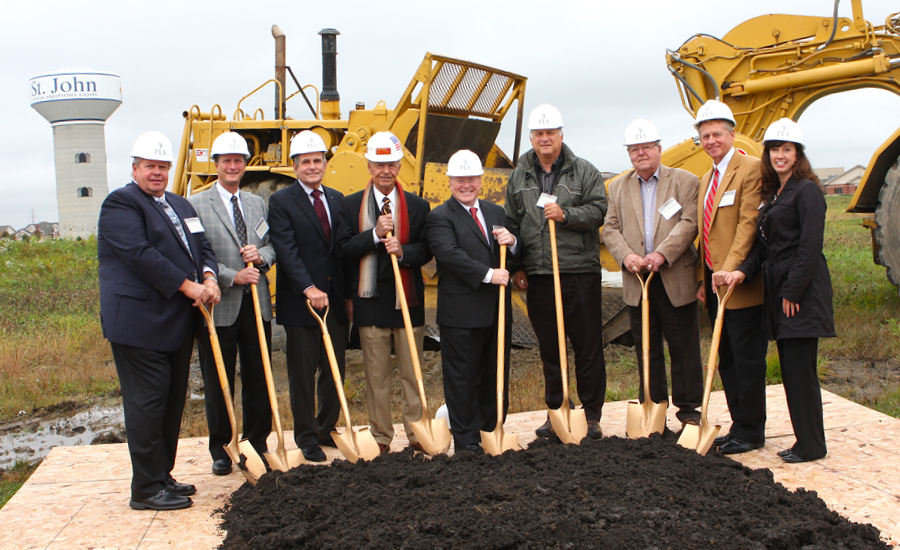 Providence life services leadership stand with shovels at park place st John groundbreaking