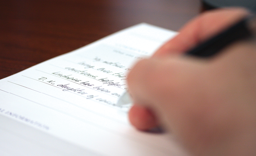 hand is shown writing providence at home testimonial