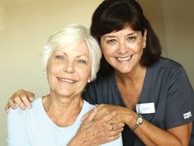 senior woman and middle aged woman enjoy providence volunteer opportunities