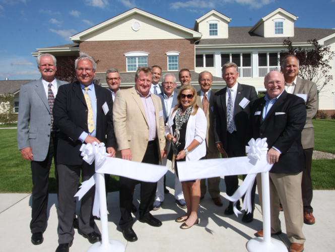 group of community leaders at park place st John ribbon-cutting ceremony