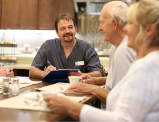 A male doctor takes park place patient's vitals