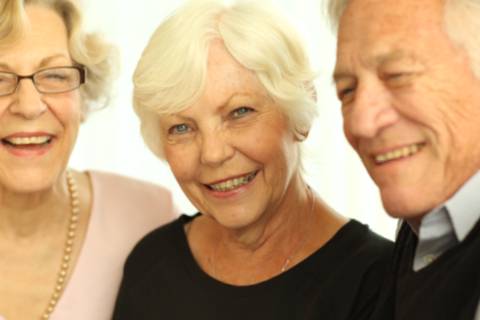 male therapist assists female rehab patient