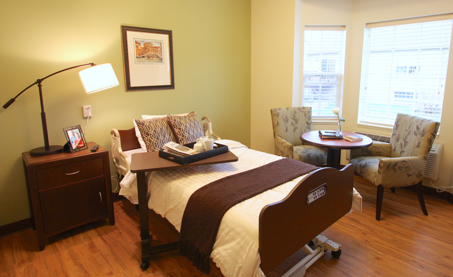 interior shot of victorian village nursing home room in small house