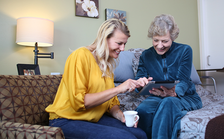 a daughter visiting her elderly mother