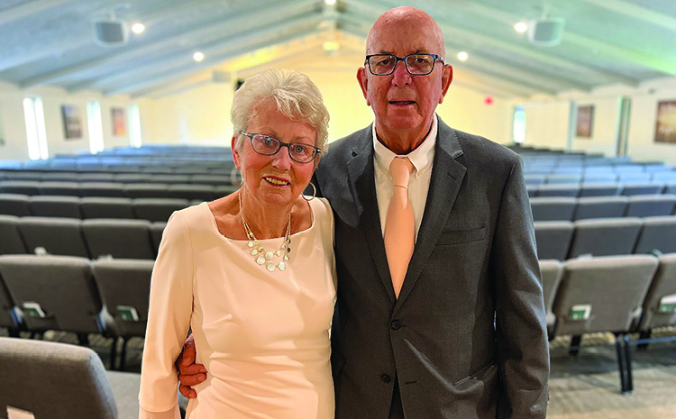 an elderly couple at a wedding