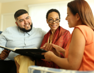 senior resident and her son discuss Assisted Living with park place staff