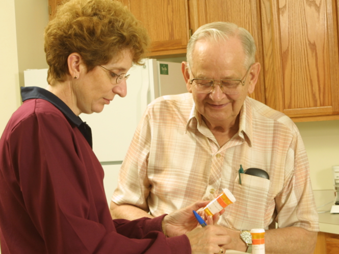 home healthcare worker helps senior man