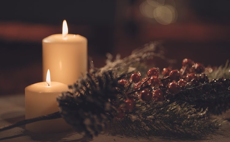 two candles in low lighting